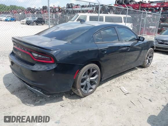 2019 Dodge Charger SXT with VIN 2C3CDXBG8KH605519, listed as a IAAI auction lot 42799824 with 138,524 mi miles and . Bid and sale history available at DreamBid. Image 4.