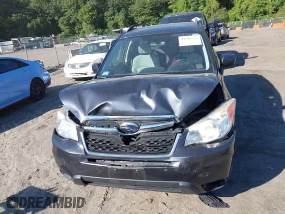 2014 Subaru Forester Premium with VIN JF2SJAEC6EH507879, listed as a IAAI auction lot 43116725 with 143,610 mi miles and . Bid and sale history available at DreamBid. Image 12.