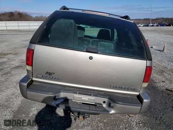 2002 Chevrolet Blazer LS с VIN 1GNCS18W22K217327, выставлен на аукционе Copart как лот 85713224 с пробегом 122 792 миль миль и Списание • Salvage title. История ставок и продаж доступна на DreamBid. Изображение 6.