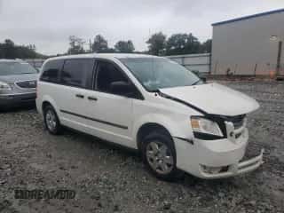 2010 Dodge Grand Caravan Cargo with VIN 2D4CN1AEXAR377301, listed as a Copart auction lot 71476774 with 125,421 mi miles and Salvage title. Bid and sale history available at DreamBid. Image 4.