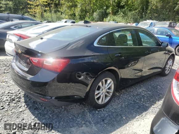2018 Chevrolet Malibu Hybrid с VIN 1G1ZF5SUXJF228288, выставлен на аукционе Copart как лот 69755155 с пробегом 107 694 миль миль и Списание • Salvage title. История ставок и продаж доступна на DreamBid. Изображение 3.