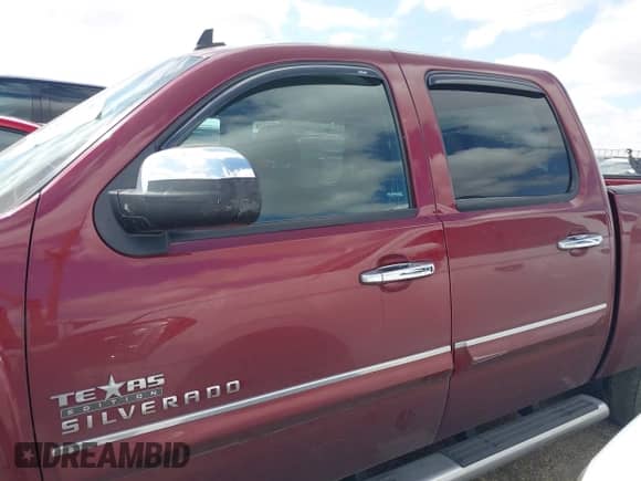 2013 Chevrolet Silverado 1500 LT z VIN 3GCPCSE09DG111674, wystawiony jako IAAI lot #43105228 z przebiegiem 82 000 mil mil oraz . Historia ofert i sprzedaży dostępna na DreamBid. Obrazek 14.