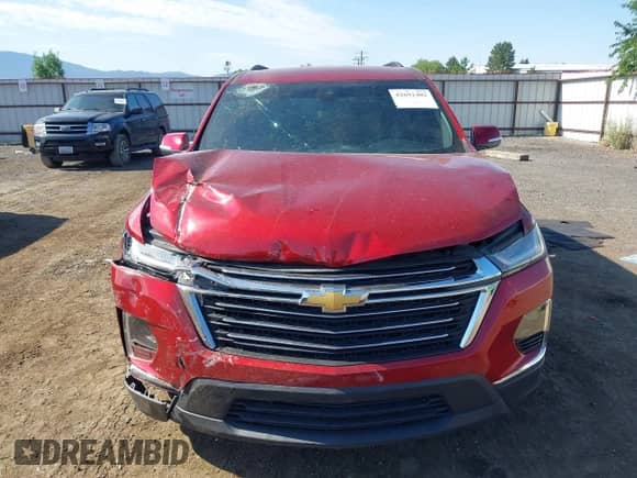 2022 Chevrolet Traverse LT Cloth z VIN 1GNEVGKW5NJ122833, wystawiony jako IAAI lot #42692402 z przebiegiem 71 466 mil mil oraz . Historia ofert i sprzedaży dostępna na DreamBid. Obrazek 13.