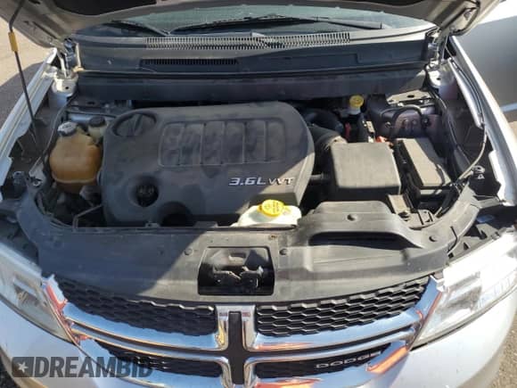 2012 Dodge Journey SXT z VIN 3C4PDDBG9CT215095, wystawiony jako Copart lot #84914405 z przebiegiem 189 885 mil mil oraz Czysty tytuł • Clean title. Historia ofert i sprzedaży dostępna na DreamBid. Obrazek 11.