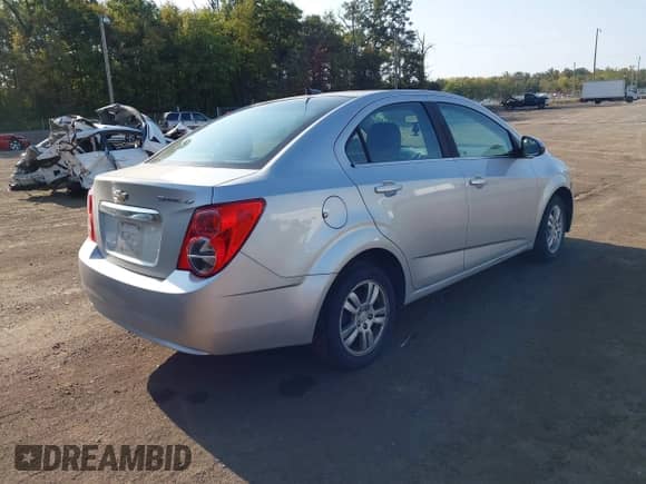 2012 Chevrolet Sonic LT with VIN 1G1JC5SH4C4180228, listed as a IAAI auction lot 43284665 with 213,906 mi miles and . Bid and sale history available at DreamBid. Image 4.