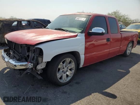 2003 GMC Sierra 1500 SLE with VIN 2GTEC19V231300391, listed as a Copart auction lot 64077725 with 194,727 mi miles and Salvage title. Bid and sale history available at DreamBid. Image 1.