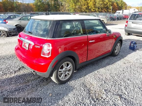 2013 MINI Hardtop with VIN WMWSU3C50DT690047, listed as a IAAI auction lot 43477533 with 93,857 mi miles and . Bid and sale history available at DreamBid. Image 4.