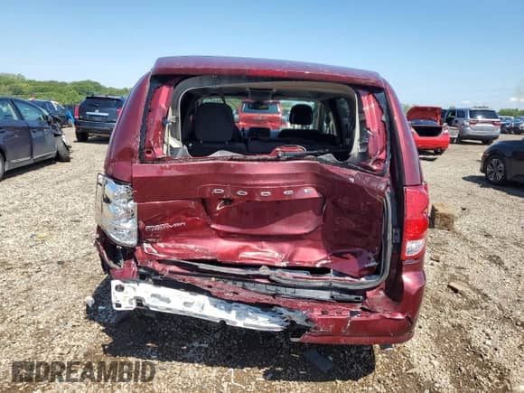 2019 Dodge Grand Caravan SE with VIN 2C4RDGBG6KR669560, listed as a Copart auction lot 70696575 with 60,584 mi miles and Salvage title. Bid and sale history available at DreamBid. Image 6.