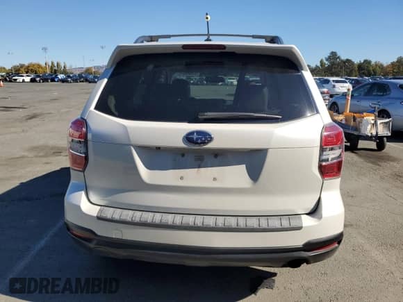2015 Subaru Forester Touring with VIN JF2SJAUC5FH401331, listed as a Copart auction lot 82628925 with 134,059 mi miles and Clean title. Bid and sale history available at DreamBid. Image 6.