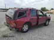 2004 Chevrolet Tahoe LS z VIN 1GNEC13V54J215424, wystawiony jako Copart lot #81526225 z przebiegiem 159 589 mil mil oraz Szkoda całkowita • Salvage title. Historia ofert i sprzedaży dostępna na DreamBid. Obrazek 3.