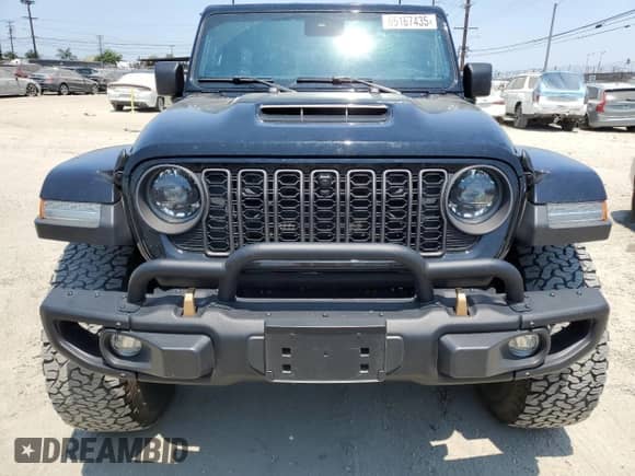 2023 Jeep Wrangler Rubicon 20th Anniversary z VIN 1C4JJXSJ0PW694745, wystawiony jako Copart lot #65167435 z przebiegiem 20 950 mil mil oraz Szkoda całkowita • Salvage title. Historia ofert i sprzedaży dostępna na DreamBid. Obrazek 5.