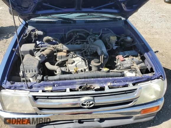 1997 Toyota Tacoma z VIN 4TAVL52N7VZ247453, wystawiony jako Copart lot #82357165 z przebiegiem 105 527 mil mil oraz Szkoda całkowita • Salvage title. Historia ofert i sprzedaży dostępna na DreamBid. Obrazek 11.