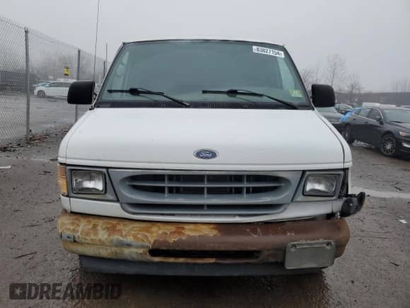 2001 Ford Econoline Cargo z VIN 1FTRE142X1HB27593, wystawiony jako Copart lot #83827154 z przebiegiem 190 761 mil mil oraz Szkoda całkowita • Salvage title. Historia ofert i sprzedaży dostępna na DreamBid. Obrazek 5.