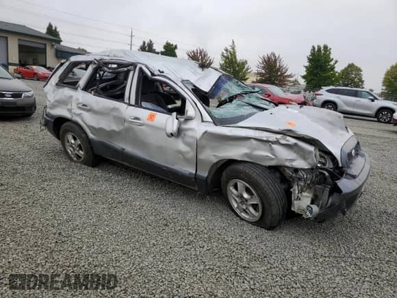 2003 Hyundai Santa Fe GLS с VIN KM8SC73D03U458797, выставлен на аукционе Copart как лот 69877294 с пробегом Не указан миль и Списание • Salvage title. История ставок и продаж доступна на DreamBid. Изображение 4.