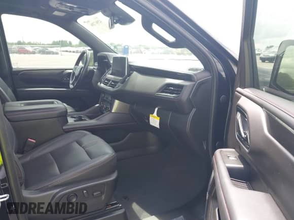 2023 Chevrolet Suburban RST z VIN 1GNSKEKD5PR124911, wystawiony jako IAAI lot #42967206 z przebiegiem 31 941 mil mil oraz . Historia ofert i sprzedaży dostępna na DreamBid. Obrazek 5.