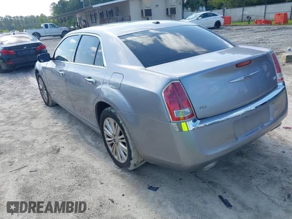 2013 Chrysler 300 with VIN 2C3CCARG0DH605717, listed as a IAAI auction lot 42693394 with 6,213 mi miles and . Bid and sale history available at DreamBid. Image 3.