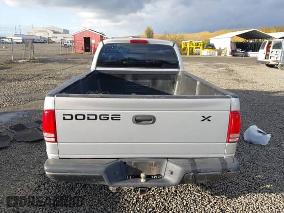 2002 Dodge Dakota с VIN 1B7GL12X42S698285, выставлен на аукционе IAAI как лот 40826030 с пробегом 211 936 миль миль и . История ставок и продаж доступна на DreamBid. Изображение 17.
