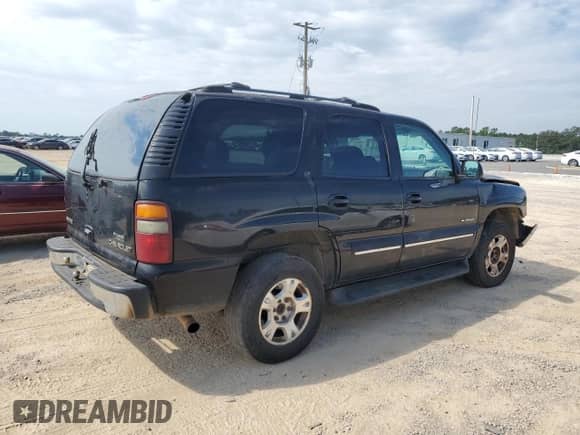 2001 Chevrolet Tahoe LS with VIN 1GNEC13T31R140928, listed as a Copart auction lot 69306735 with 240,666 mi miles and Salvage title. Bid and sale history available at DreamBid. Image 3.