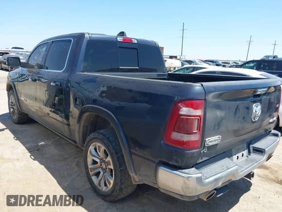 2021 Ram 1500 Longhorn z VIN 1C6SRFKT6MN616438, wystawiony jako IAAI lot #42913517 z przebiegiem 143 490 mil mil oraz . Historia ofert i sprzedaży dostępna na DreamBid. Obrazek 3.