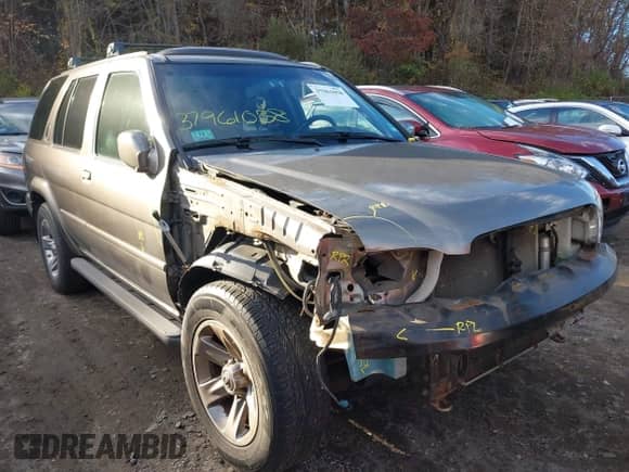 2004 Nissan Pathfinder SE z VIN JN8DR09Y44W908815, wystawiony jako IAAI lot #41358024 z przebiegiem 88 712 mil mil oraz . Historia ofert i sprzedaży dostępna na DreamBid. Obrazek 1.