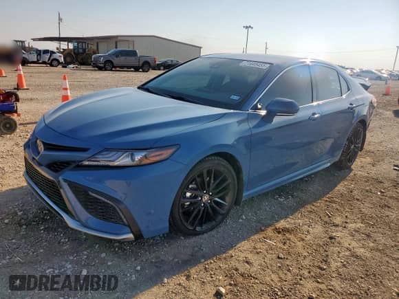 2023 Toyota Camry Hybrid XSE с VIN 4T1K31AK7PU046557, выставлен на аукционе Copart как лот 71445455 с пробегом 33 068 миль миль и Списание • Salvage title. История ставок и продаж доступна на DreamBid. Изображение 1.