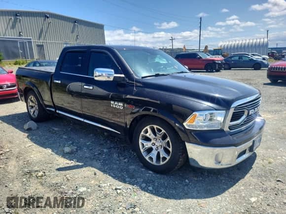 2016 Ram 1500 Longhorn z VIN 1C6RR7WMXGS226438, wystawiony jako Copart lot #62352395 z przebiegiem Nie podano mil oraz Szkoda całkowita • Salvage title. Historia ofert i sprzedaży dostępna na DreamBid. Obrazek 4.