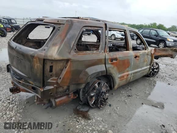 2009 Jeep Grand Cherokee с VIN 1J8HR68T29C512518, выставлен на аукционе Copart как лот 86664654 с пробегом Не указан миль и Списание • Salvage title. История ставок и продаж доступна на DreamBid. Изображение 3.