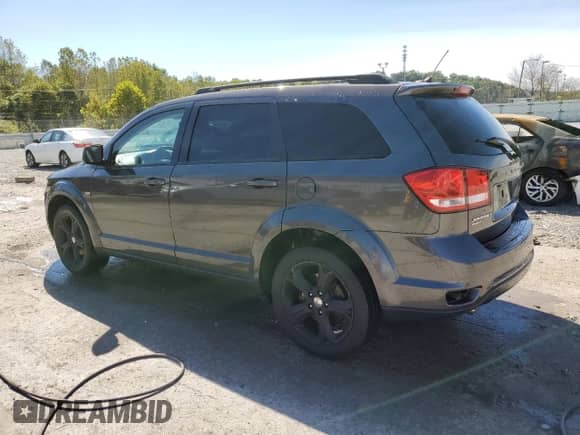 2015 Dodge Journey SXT with VIN 3C4PDDBG9FT646170, listed as a Copart auction lot 85193125 with 177,837 mi miles and Salvage title. Bid and sale history available at DreamBid. Image 2.