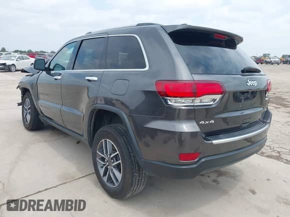 2021 Jeep Grand Cherokee 80th Anniversary with VIN 1C4RJFBG0MC504148, listed as a IAAI auction lot 42063979 with 77,941 mi miles and . Bid and sale history available at DreamBid. Image 3.