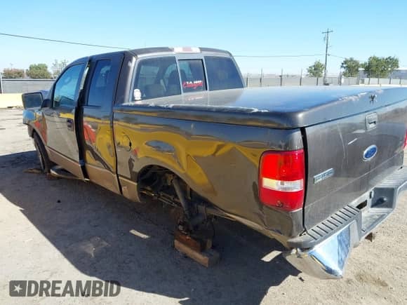 2005 Ford F-150 XLT with VIN 1FTRX12565KE53472, listed as a IAAI auction lot 43358301 with 195,394 mi miles and . Bid and sale history available at DreamBid. Image 3.