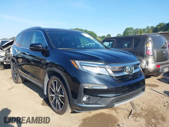 2019 Honda Pilot Touring 8-Passenger with VIN 5FNYF6H99KB011820, listed as a IAAI auction lot 42799995 with 72,904 mi miles and . Bid and sale history available at DreamBid. Image 1.
