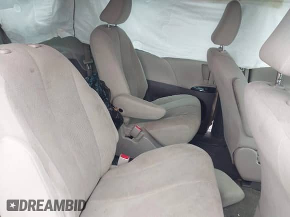 2014 Toyota Sienna L with VIN 5TDZK3DC2ES522589, listed as a IAAI auction lot 42457609 with 222,836 mi miles and . Bid and sale history available at DreamBid. Image 8.