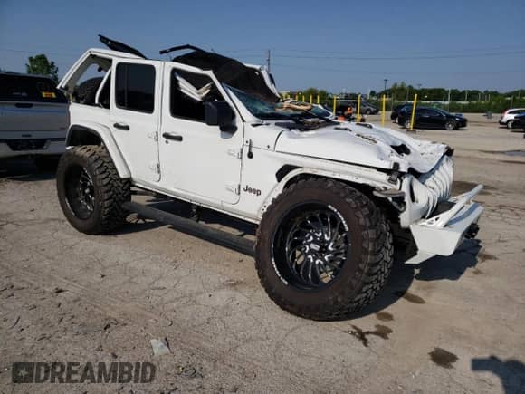 2023 Jeep Wrangler Rubicon 20th Anniversary with VIN 1C4JJXSJ4PW565990, listed as a Copart auction lot 59631365 with Not provided miles and Salvage title. Bid and sale history available at DreamBid. Image 4.