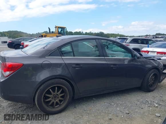 2011 Chevrolet Cruze 1LT with VIN 1G1PF5S92B7129513, listed as a IAAI auction lot 43320927 with 150,000 mi miles and . Bid and sale history available at DreamBid. Image 13.