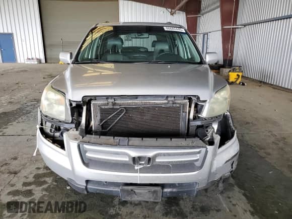 2006 Honda Pilot EX-L z VIN 5FNYF28556B014645, wystawiony jako Copart lot #86682445 z przebiegiem 216 000 mil mil oraz Szkoda całkowita • Salvage title. Historia ofert i sprzedaży dostępna na DreamBid. Obrazek 5.