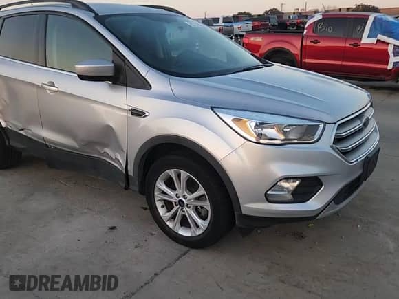 2018 Ford Escape SE with VIN 1FMCU9GD0JUB93710, listed as a Copart auction lot 85751065 with 138,902 mi miles and Salvage title. Bid and sale history available at DreamBid. Image 14.