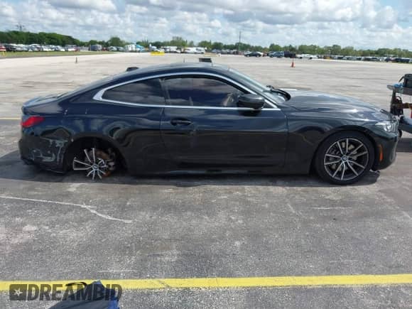 2025 BMW 4 Series 430i with VIN WBA43DA0XSCS96593, listed as a IAAI auction lot 42570073 with 23,469 mi miles and . Bid and sale history available at DreamBid. Image 13.