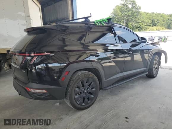 2023 Hyundai Tucson XRT with VIN KM8JFCAE0PU219909, listed as a Copart auction lot 62232115 with 50,187 mi miles and Salvage title. Bid and sale history available at DreamBid. Image 3.