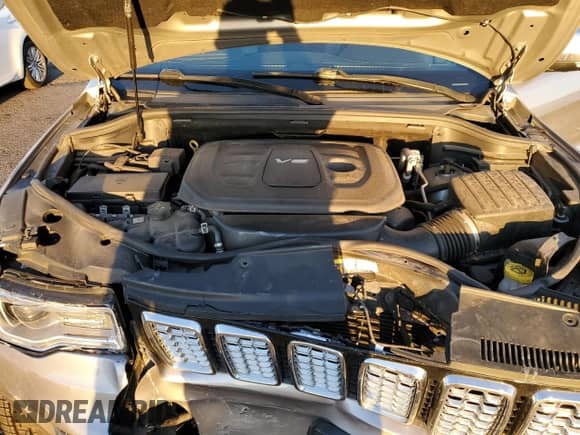 2017 Jeep Grand Cherokee Overland with VIN 1C4RJFCGXHC756588, listed as a Copart auction lot 84282675 with 101,960 mi miles and Salvage title. Bid and sale history available at DreamBid. Image 12.