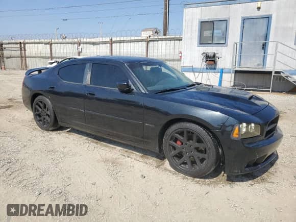 2006 Dodge Charger SRT-8 с VIN 2B3LA73WX6H474014, выставлен на аукционе Copart как лот 60564085 с пробегом Не указан миль и Списание • Salvage title. История ставок и продаж доступна на DreamBid. Изображение 4.
