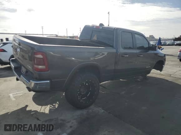 2020 Ram 1500 Laramie с VIN 1C6SRFDT1LN263036, выставлен на аукционе Copart как лот 48560655 с пробегом 130 923 миль миль и Списание • Salvage title. История ставок и продаж доступна на DreamBid. Изображение 3.