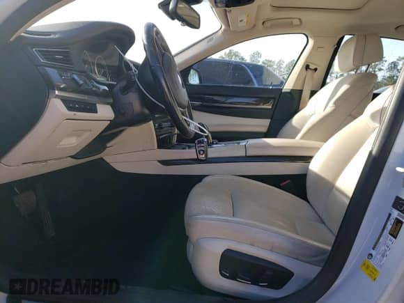 2013 BMW 7 Series 750i with VIN WBAYA8C55DC996693, listed as a Copart auction lot 80233423 with 140,925 mi miles and Salvage title. Bid and sale history available at DreamBid. Image 7.