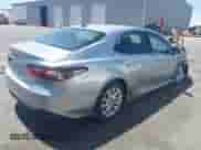 2021 Toyota Camry LE with VIN 4T1C11AK2MU538371, listed as a IAAI auction lot 42860035 with 90,662 mi miles and . Bid and sale history available at DreamBid. Image 4.