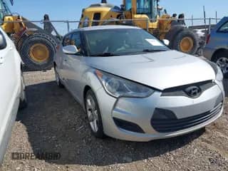 2012 Hyundai Veloster w/Black Int с VIN KMHTC6AD4CU021595, выставлен на аукционе IAAI как лот 42004371 с пробегом 149 637 миль миль и . История ставок и продаж доступна на DreamBid. Изображение 1.
