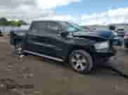 2021 Ram 1500 Laramie with VIN 1C6SRFJTXMN820404, listed as a Copart auction lot 69876845 with Not provided miles and Salvage title. Bid and sale history available at DreamBid. Image 4.