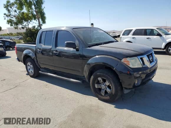 2012 Nissan Frontier SL with VIN 1N6AD0ER7CC428731, listed as a Copart auction lot 64592725 with 206,822 mi miles and Salvage title. Bid and sale history available at DreamBid. Image 4.