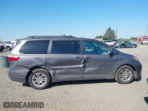 2016 Toyota Sienna XLE with VIN 5TDYK3DC8GS701587, listed as a IAAI auction lot 42444516 with 215,684 mi miles and . Bid and sale history available at DreamBid. Image 13.