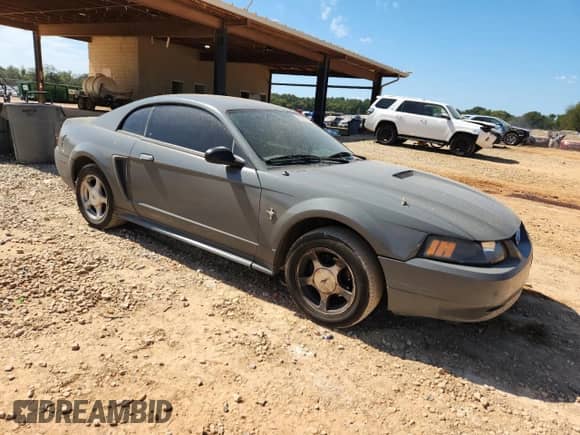 2001 Ford Mustang Standard z VIN 1FAFP404X1F163002, wystawiony jako Copart lot #85290775 z przebiegiem 255 194 mil mil oraz Szkoda całkowita • Salvage title. Historia ofert i sprzedaży dostępna na DreamBid. Obrazek 4.
