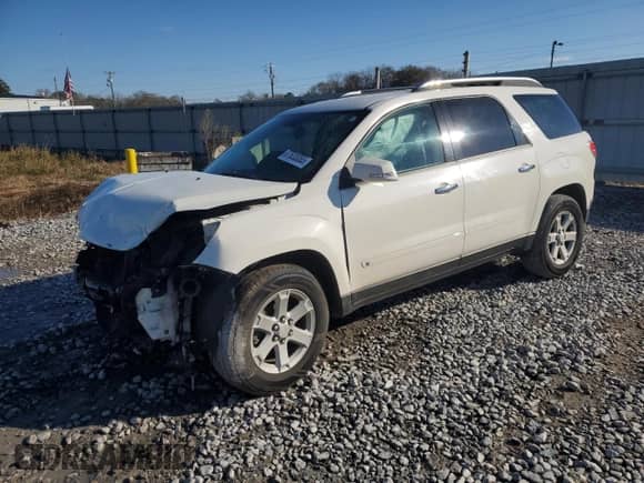 2009 Saturn Outlook XE with VIN 5GZEV13D19J208826, listed as a Copart auction lot 87833065 with 134,749 mi miles and Salvage title. Bid and sale history available at DreamBid. Image 1.