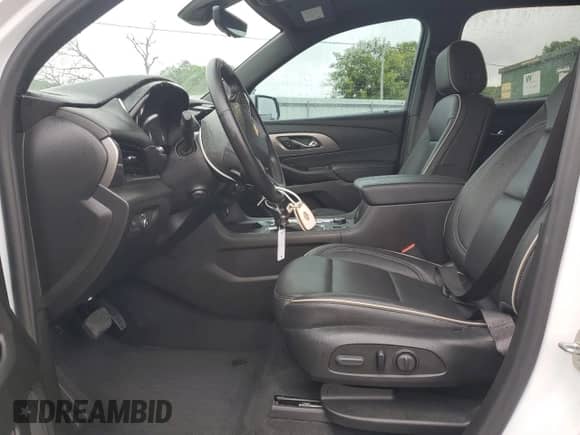 2023 Chevrolet Traverse Premier с VIN 1GNEVKKW2PJ288278, выставлен на аукционе Copart как лот 66841495 с пробегом 40 407 миль миль и Списание • Salvage title. История ставок и продаж доступна на DreamBid. Изображение 7.